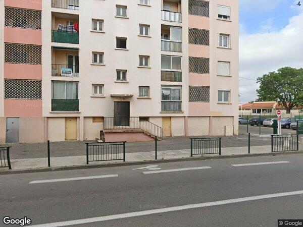 UN APPARTEMENT AVEC CAVE ET EMPLACEMENT DE PARKING