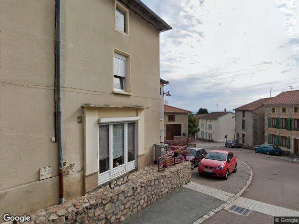 UNE MAISON DE VILLE À USAGE MIXTE