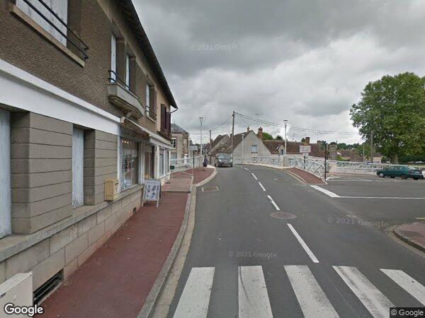 UN IMMEUBLE À USAGE DE COMMERCE ET D’HABITATION