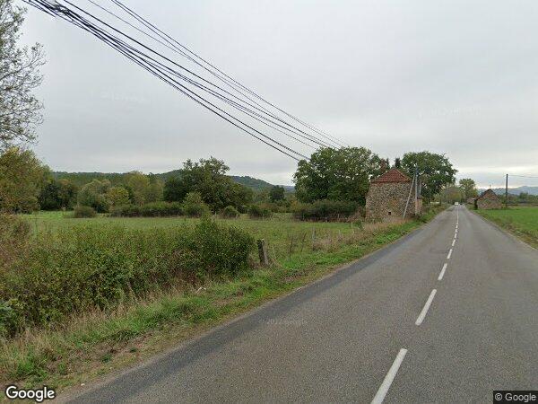 DEUX HANGARS MÉTALLIQUES ET PARCELLES ATTENANTES