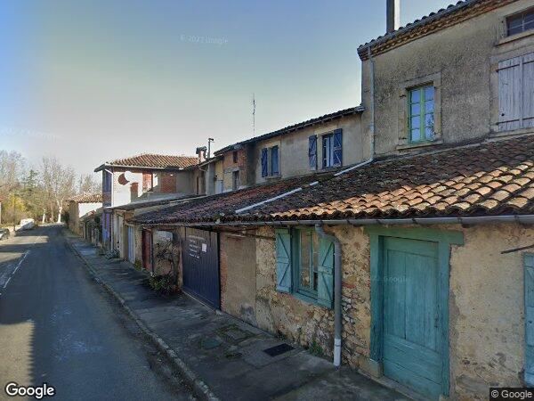 UNE MAISON D'HABITATION AVEC GARAGE ET UNE PARCELLE DE TERRE NON-ATTENANTE