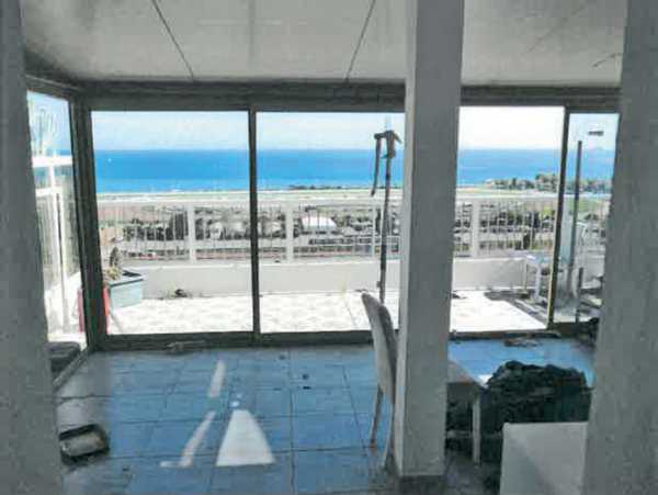 UN APPARTEMENT AVEC SOLARIUM, UN PARKING ET UNE CAVE