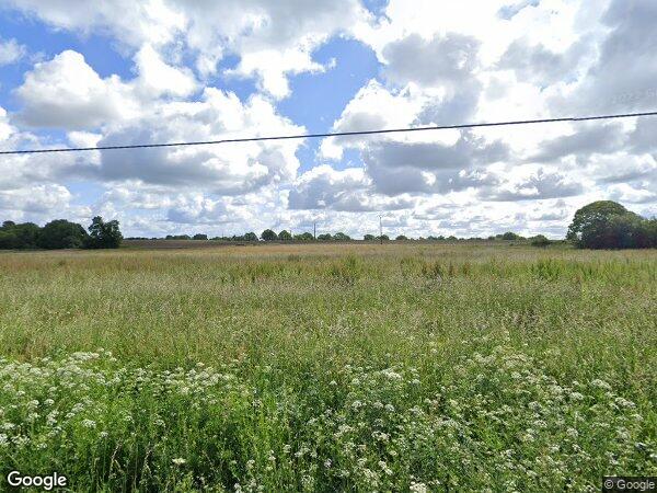 UN BÂTIMENT AGRICOLE À USAGE DE STABULATION ET STOCKAGE ET DIVERSES PARCELLES DE TERRE