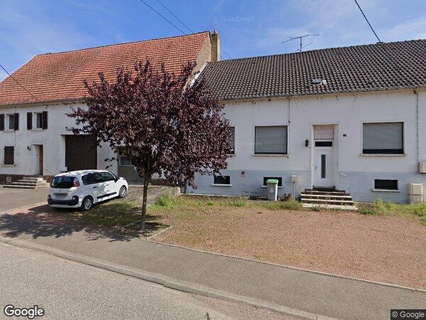 UNE MAISON À USAGE D'HABITATION