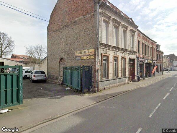 UN IMMEUBLE A USAGE D’HABITATION