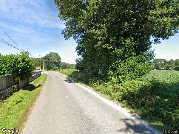 UNE MAISON D'HABITATION ET UNE PARCELLE DE TERRE