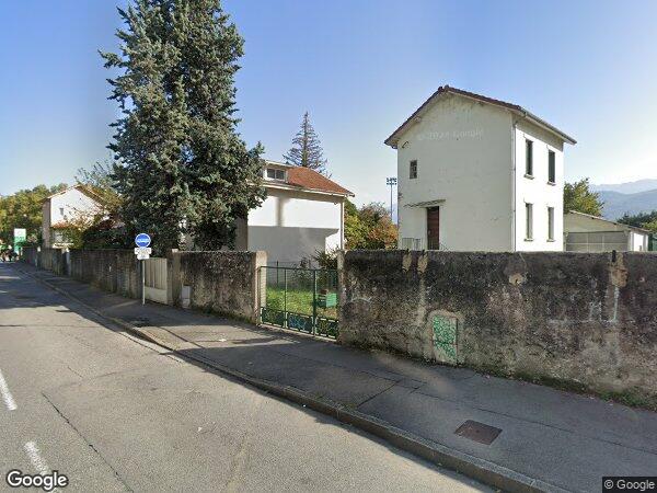 UN APPARTEMENT AVEC CAVE ET 5 BOX DE GARAGE