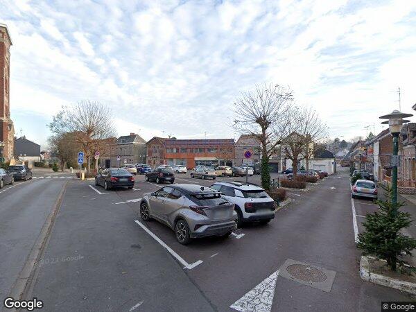 UN IMMEUBLE MIXTE A USAGE DE COMMERCE ET D’HABITATION ÉLEVÉ EN BRIQUES SUR CAVE