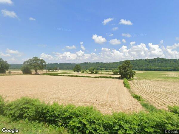 UNE MAISON D'HABITATION ET PARCELLES EN NATURE DE TERRAIN