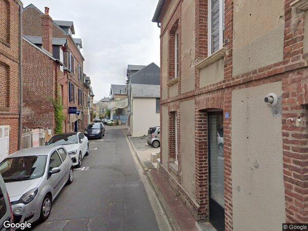 UN IMMEUBLE À USAGE DE COMMERCE ET D’HABITATION