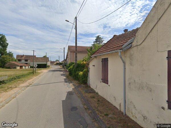 UNE MAISON D'HABITATION AVEC TERRAIN