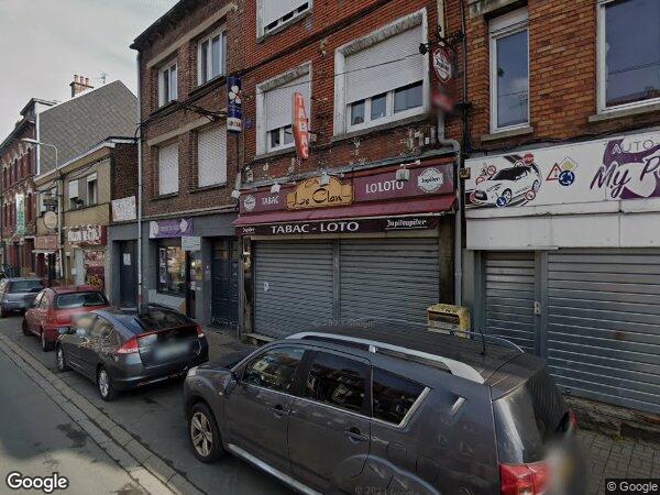 UN LOCAL COMMERCIAL ET D'HABITATION