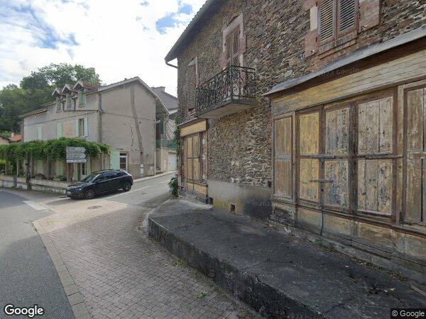 UNE MAISON D'HABITATION AVEC TERRAIN ATTENANT
