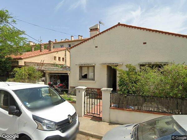 UNE MAISON À USAGE D'HABITATION