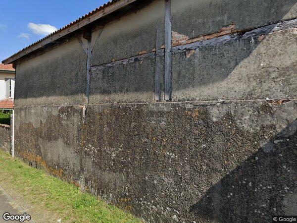 UNE MAISON À USAGE D'HABITATION