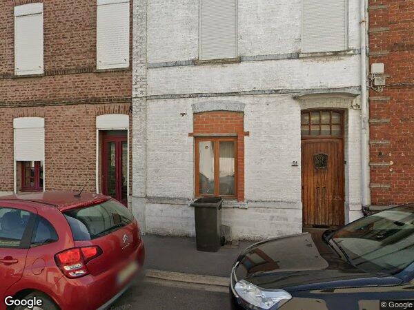 UNE MAISON A USAGE D'HABITATION ET UN GARAGE NON ATTENANT