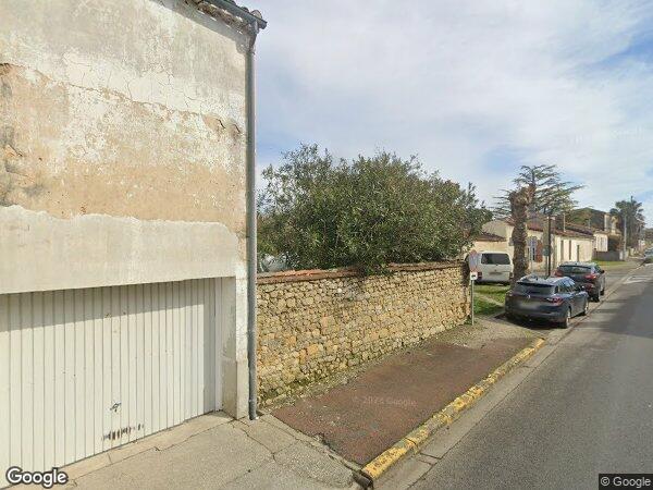 UNE MAISON INDIVIDUELLE À USAGE D'HABITATION