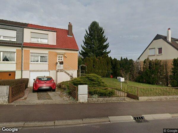 UNE MAISON D'HABITATION