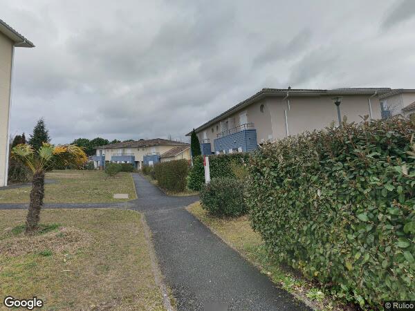 UN APPARTEMENT DE TYPE T3 AVEC BALCON