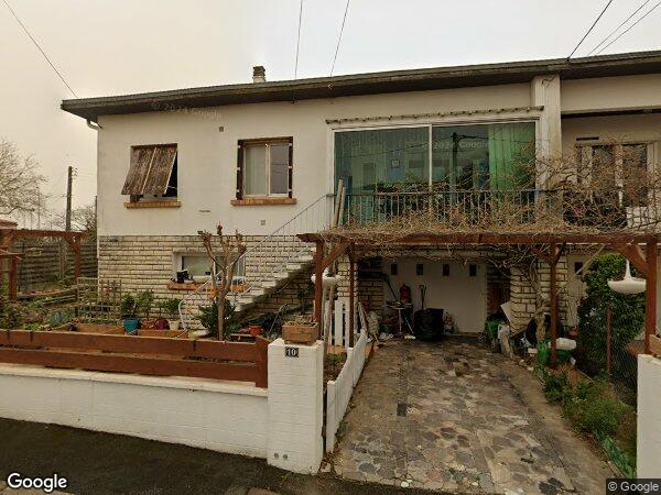 UNE MAISON D'HABITATION