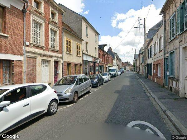 UN IMMEUBLE EN PARTIE À USAGE  D’HABITATION