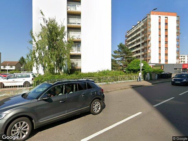 UN APPARTEMENT ET UN EMPLACEMENT DE PARKING