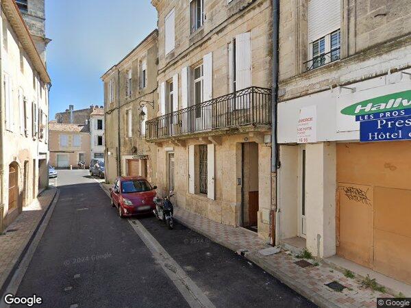 UN IMMEUBLE À USAGE MIXTE D'HABITATION ET COMMERCIAL