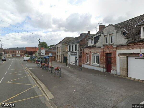 UNE MAISON A USAGE D'HABITATION EN DOUBLE MITOYENNETE