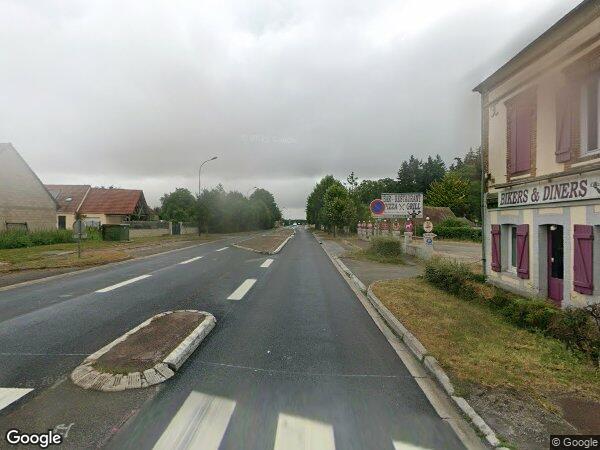 UN IMMEUBLE À USAGE COMMERCIAL ET D'HABITATION