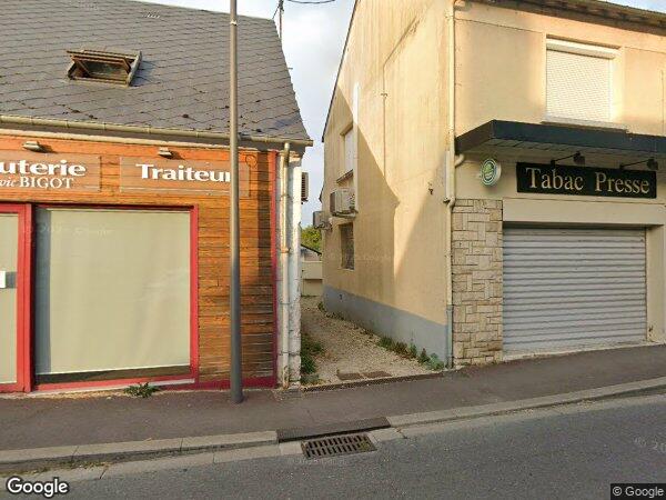 UN IMMEUBLE À USAGE DE COMMERCE ET D'HABITATION