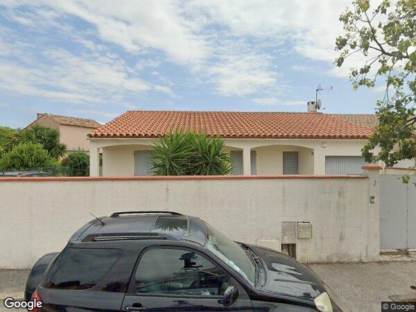 UNE MAISON À USAGE D'HABITATION