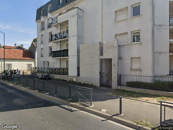 UN APPARTEMENT ET UNE PLACE DE PARKING