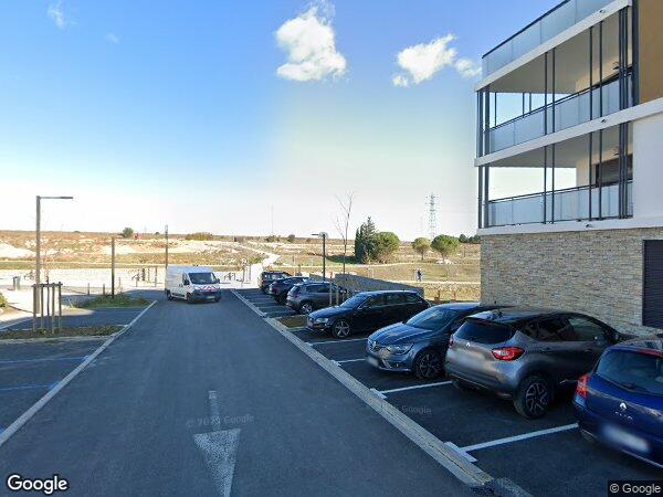 UN APPARTEMENT DE TYPE 3 ET DES PARKINGS