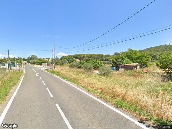 UN BÂTIMENT À USAGE D’ENTREPÔTS ET ATELIER AGRICOLE