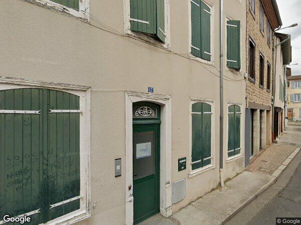 UN BÂTIMENT À USAGE DE LOCAL PROFESSIONNEL ET D'HABITATION