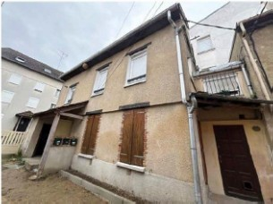 UNE MAISON