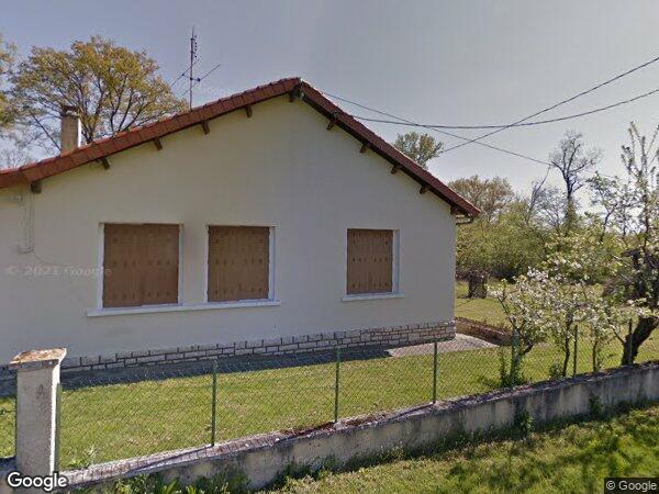 UNE MAISON D'HABITATION