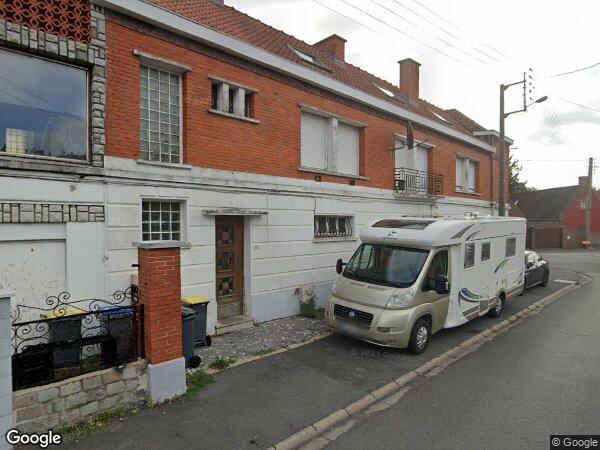 UN IMMEUBLE À USAGE D'HABITATION