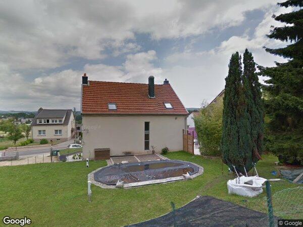 UNE MAISON À USAGE D'HABITATION