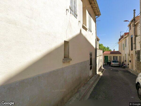 UNE MAISON À USAGE D'HABITATION