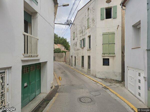 UNE MAISON À USAGE D'HABITATION