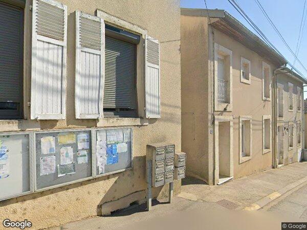 UNE MAISON À USAGE D'HABITATION