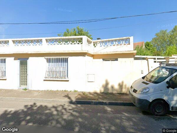 UNE MAISON À USAGE D'HABITATION