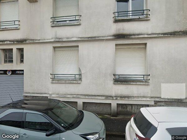 UN IMMEUBLE À USAGE D'HABITATION