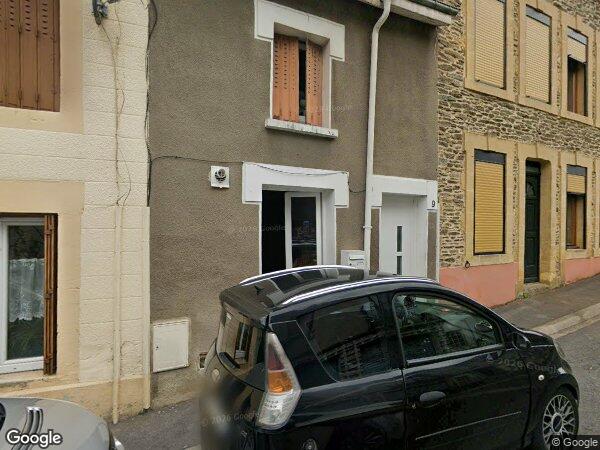 UNE MAISON À USAGE D'HABITATION