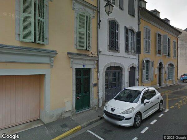 UN IMMEUBLE COMPOSÉ D’APPARTEMENTS