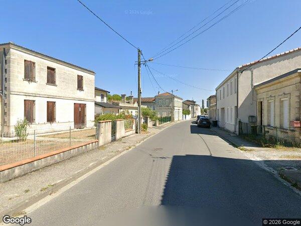 UN IMMEUBLE EN PIERRES